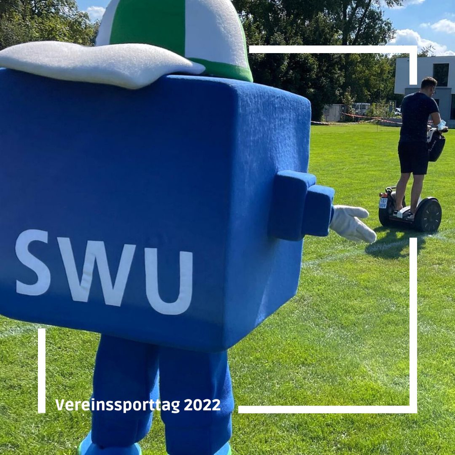 SWU cube mascot on grass, person on Segway, Vereinssporttag 2022